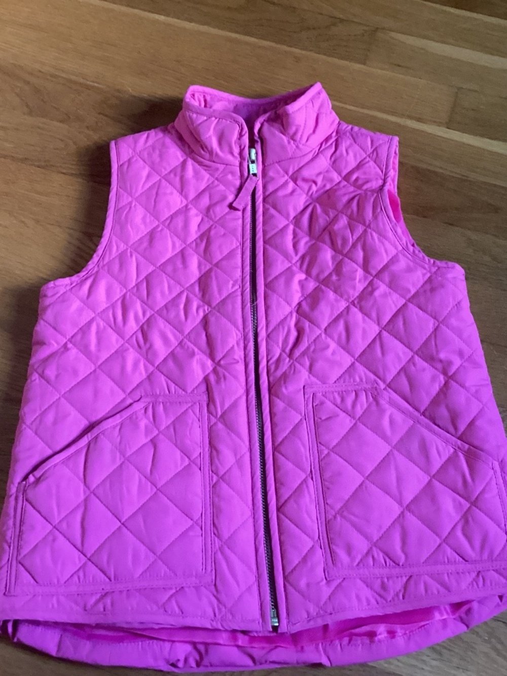 A  magenta size 6-7 J. Crew vest